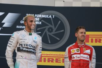 World © Octane Photographic Ltd. Mercedes AMG Petronas F1 W06 Hybrid – Lewis Hamilton (1st) and Scuderia Ferrari SF15-T– Sebastian Vettel (3rd).. Sunday 27th September 2015, F1 Japanese Grand Prix, Podium, Suzuka. Digital Ref: