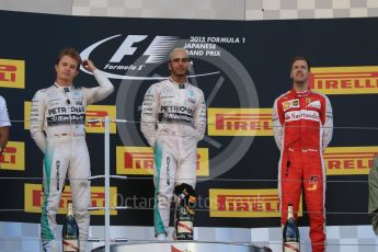 World © Octane Photographic Ltd. Mercedes AMG Petronas F1 W06 Hybrid – Lewis Hamilton (1st), Nico Rosberg (2nd) and Scuderia Ferrari SF15-T– Sebastian Vettel (3rd). Sunday 27th September 2015, F1 Japanese Grand Prix, Podium, Suzuka. Digital Ref: