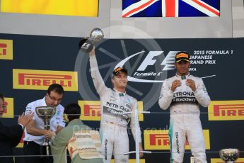 World © Octane Photographic Ltd. Mercedes AMG Petronas F1 W06 Hybrid – Lewis Hamilton (1st) and Nico Rosberg (2nd). Sunday 27th September 2015, F1 Japanese Grand Prix, Podium, Suzuka. Digital Ref: