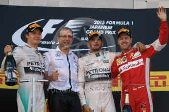 World © Octane Photographic Ltd. Mercedes AMG Petronas F1 W06 Hybrid – Lewis Hamilton (1st), Nico Rosberg (2nd) and Scuderia Ferrari SF15-T– Sebastian Vettel (3rd). Sunday 27th September 2015, F1 Japanese Grand Prix, Podium, Suzuka. Digital Ref: