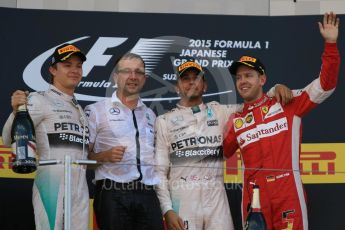 World © Octane Photographic Ltd. Mercedes AMG Petronas F1 W06 Hybrid – Lewis Hamilton (1st), Nico Rosberg (2nd) and Scuderia Ferrari SF15-T– Sebastian Vettel (3rd). Sunday 27th September 2015, F1 Japanese Grand Prix, Podium, Suzuka. Digital Ref:
