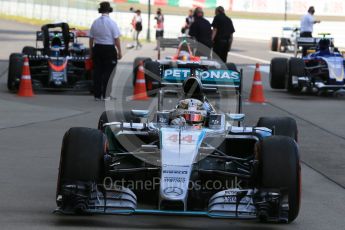 World © Octane Photographic Ltd. Mercedes AMG Petronas F1 W06 Hybrid – Lewis Hamilton (1st). Sunday 27th September 2015, F1 Japanese Grand Prix, Parc Ferme, Suzuka. Digital Ref: