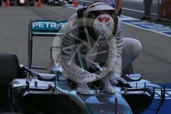 World © Octane Photographic Ltd. Mercedes AMG Petronas F1 W06 Hybrid – Lewis Hamilton (1st). Sunday 27th September 2015, F1 Japanese Grand Prix, Parc Ferme, Suzuka. Digital Ref: