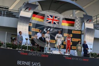 World © Octane Photographic Ltd. Mercedes AMG Petronas F1 W06 Hybrid – Lewis Hamilton (1st), Nico Rosberg (2nd) and Scuderia Ferrari SF15-T– Sebastian Vettel (3rd). Sunday 27th September 2015, F1 Japanese Grand Prix, Podium, Suzuka. Digital Ref:
