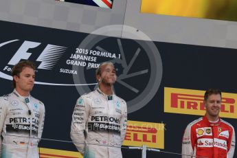 World © Octane Photographic Ltd. Mercedes AMG Petronas F1 W06 Hybrid – Lewis Hamilton (1st), Nico Rosberg (2nd) and Scuderia Ferrari SF15-T– Sebastian Vettel (3rd). Sunday 27th September 2015, F1 Japanese Grand Prix, Podium, Suzuka. Digital Ref:
