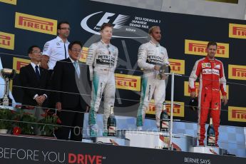 World © Octane Photographic Ltd. Mercedes AMG Petronas F1 W06 Hybrid – Lewis Hamilton (1st), Nico Rosberg (2nd) and Scuderia Ferrari SF15-T– Sebastian Vettel (3rd). Sunday 27th September 2015, F1 Japanese Grand Prix, Podium, Suzuka. Digital Ref: