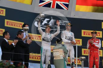 World © Octane Photographic Ltd. Mercedes AMG Petronas F1 W06 Hybrid – Lewis Hamilton (1st), Nico Rosberg (2nd) and Scuderia Ferrari SF15-T– Sebastian Vettel (3rd). Sunday 27th September 2015, F1 Japanese Grand Prix, Podium, Suzuka. Digital Ref: