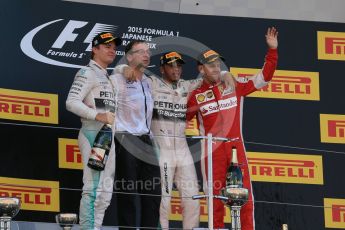 World © Octane Photographic Ltd. Mercedes AMG Petronas F1 W06 Hybrid – Lewis Hamilton (1st), Nico Rosberg (2nd) and Scuderia Ferrari SF15-T– Sebastian Vettel (3rd). Sunday 27th September 2015, F1 Japanese Grand Prix, Podium, Suzuka. Digital Ref: