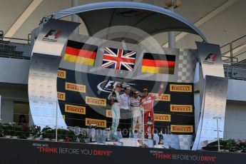 World © Octane Photographic Ltd. Mercedes AMG Petronas F1 W06 Hybrid – Lewis Hamilton (1st), Nico Rosberg (2nd) and Scuderia Ferrari SF15-T– Sebastian Vettel (3rd). Sunday 27th September 2015, F1 Japanese Grand Prix, Podium, Suzuka. Digital Ref: