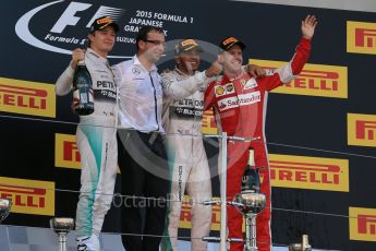 World © Octane Photographic Ltd. Mercedes AMG Petronas F1 W06 Hybrid – Lewis Hamilton (1st), Nico Rosberg (2nd) and Scuderia Ferrari SF15-T– Sebastian Vettel (3rd). Sunday 27th September 2015, F1 Japanese Grand Prix, Podium, Suzuka. Digital Ref: