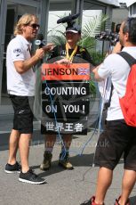 World © Octane Photographic Ltd. Fan being interviewed in the paddock. Saturday 26th September 2015, F1 Japanese Grand Prix, Paddock, Suzuka. Digital Ref: 1445CB5D1846