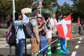 World © Octane Photographic Ltd. The Japanese fans waiting at the paddock entrance. Saturday 26th September 2015, F1 Japanese Grand Prix, Paddock, Suzuka. Digital Ref: 1445CB7D6348