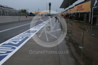 World © Octane Photographic Ltd. Wet pit lane. Thursday 24th September 2015, F1 Japanese Grand Prix, Setup, Suzuka. Digital Ref: 1439CB7D4290