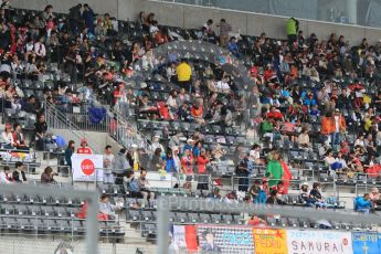 World © Octane Photographic Ltd. Fas in the pit lane grandstand. Thursday 24th September 2015, F1 Japanese Grand Prix, Setup, Suzuka. Digital Ref: 1439CB7D4258