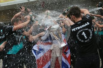 World © Octane Photographic Ltd. Mercedes AMG Petronas F1 team – Lewis Hamilton, celebrate on winning the USA GP, with enough points to take the World Drivers Championship (WDC) Sunday 25th October 2015, F1 USA Grand Prix, Austin, Texas - Circuit of the Americas (COTA). Digital Ref: 1468LB1D3380