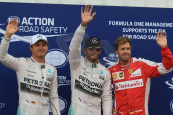 World © Octane Photographic Ltd. Mercedes AMG Petronas F1 W06 Hybrid – Lewis Hamilton and Nico Rosberg plus Scuderia Ferrari SF15-T– Sebastian Vettel. Saturday 23rd May 2015, F1 Qualifying Parc Ferme, Monte Carlo, Monaco. Digital Ref: 1282CB7D5904