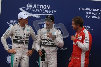 World © Octane Photographic Ltd. Mercedes AMG Petronas F1 W06 Hybrid – Lewis Hamilton and Nico Rosberg plus Scuderia Ferrari SF15-T– Sebastian Vettel. Saturday 23rd May 2015, F1 Qualifying Parc Ferme, Monte Carlo, Monaco. Digital Ref: 1282LB1D7454
