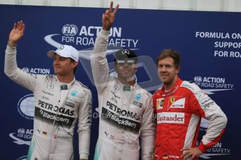 World © Octane Photographic Ltd. Mercedes AMG Petronas F1 W06 Hybrid – Lewis Hamilton and Nico Rosberg plus Scuderia Ferrari SF15-T– Sebastian Vettel. Saturday 23rd May 2015, F1 Qualifying, Monte Carlo, Monaco. Digital Ref: 1282LB1D7463