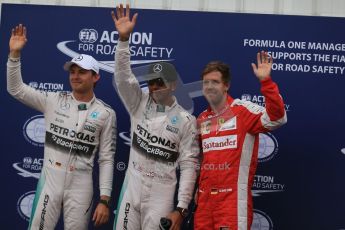 World © Octane Photographic Ltd. Mercedes AMG Petronas F1 W06 Hybrid – Lewis Hamilton and Nico Rosberg plus Scuderia Ferrari SF15-T– Sebastian Vettel. Saturday 23rd May 2015, F1 Qualifying Parc Ferme, Monte Carlo, Monaco. Digital Ref: 1282LB1D7472