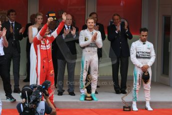 World © Octane Photographic Ltd. Mercedes AMG Petronas F1 W06 Hybrid – Nico Rosberg, Scuderia Ferrari SF15-T– Sebastian Vettel and Lewis Hamilton. Sunday 24th May 2015, F1 Race - Podium, Monte Carlo, Monaco. Digital Ref: 1287CB7D8252