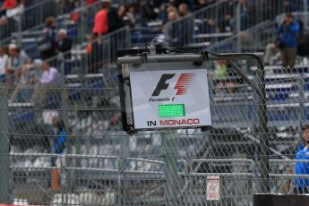 World © Octane Photographic Ltd. Green flag. Thursday 21st May 2015, F1 Practice 2, Monte Carlo, Monaco. Digital Ref: 1274CB7D3277