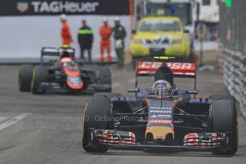 World © Octane Photographic Ltd. Scuderia Toro Rosso STR10 – Carlos Sainz Jnr and McLaren Honda MP4/30 - Jenson Button. Thursday 21st May 2015, F1 Practice 2, Monte Carlo, Monaco. Digital Ref: 1274CB7D3658