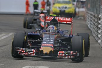 World © Octane Photographic Ltd. Scuderia Toro Rosso STR10 – Carlos Sainz Jnr and McLaren Honda MP4/30 - Jenson Button. Thursday 21st May 2015, F1 Practice 2, Monte Carlo, Monaco. Digital Ref: 1274CB7D3661