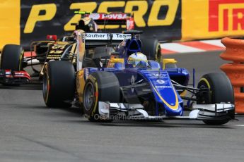 World © Octane Photographic Ltd. Sauber F1 Team C34-Ferrari – Marcus Ericsson and Lotus F1 Team E23 Hybrid – Pastor Maldonado. Thursday 21st May 2015, F1 Practice 1, Monte Carlo, Monaco. Digital Ref: 1272CB7D2990