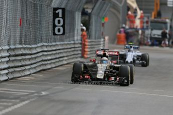 World © Octane Photographic Ltd. Lotus F1 Team E23 Hybrid – Romain Grosjean and Williams Martini Racing FW37 – Valtteri Bottas. Thursday 21st May 2015, F1 Practice 1, Monte Carlo, Monaco. Digital Ref: 1272LB1D3821
