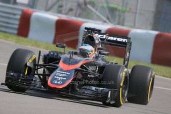 World © Octane Photographic Ltd. McLaren Honda MP4/30 – Fernando Alonso. Friday 5th June 2015, F1 Canadian GP Practice 1, Circuit Gilles Villeneuve, Montreal, Canada. Digital Ref: 1291LB1D9380