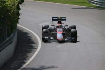 World © Octane Photographic Ltd. McLaren Honda MP4/30 - Jenson Button. Friday 5th June 2015, F1 Canadian GP Practice 1, Circuit Gilles Villeneuve, Montreal, Canada. Digital Ref: 1291LB1D9535