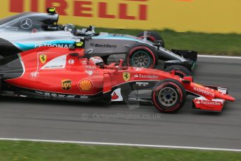 World © Octane Photographic Ltd. Scuderia Ferrari SF15-T– Kimi Raikkonen and Mercedes AMG Petronas F1 W06 Hybrid – Nico Rosberg. Friday 5th June 2015, F1 Practice 2, Circuit Gilles Villeneuve, Montreal, Canada. Digital Ref: 1292LB1D0102