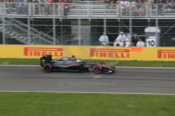 World © Octane Photographic Ltd. McLaren Honda MP4/30 – Fernando Alonso. Friday 5th June 2015, F1 Canadian GP Practice 2, Circuit Gilles Villeneuve, Montreal, Canada. Digital Ref: 1292LB1D0266