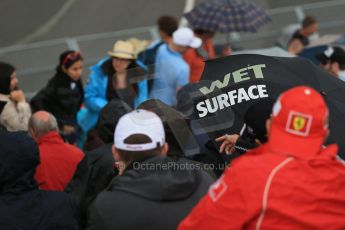 World © Octane Photographic Ltd. Fans in the grandstand with "Wet Surface" umbrella. Friday 5th June 2015, F1 Practice 2, Circuit Gilles Villeneuve, Montreal, Canada. Digital Ref: 1292LB1D0341