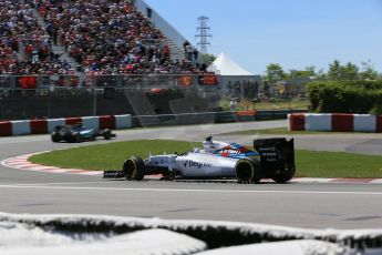 World © Octane Photographic Ltd. Mercedes AMG Petronas F1 W06 Hybrid – Nico Rosberg and Williams Martini Racing FW37 – Valtteri Bottas. Saturday 6th June 2015, F1 Qualifying, Circuit Gilles Villeneuve, Montreal, Canada. Digital Ref: 1296LB1D1908