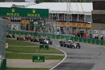 World © Octane Photographic Ltd. Mercedes AMG Petronas F1 W06 Hybrid – Lewis Hamilton leads Nico Rosberg on the opening lap. Sunday 7th June 2015, F1 Canadian GP Race, Circuit Gilles Villeneuve, Montreal, Canada. Digital Ref: 1299LB1D3585