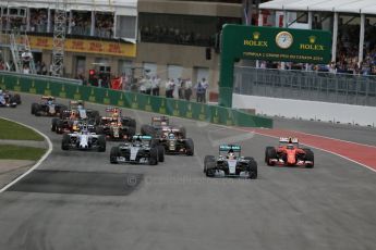 World © Octane Photographic Ltd. Mercedes AMG Petronas F1 W06 Hybrid – Lewis Hamilton leads Nico Rosberg on the opening lap. Sunday 7th June 2015, F1 Canadian GP Race, Circuit Gilles Villeneuve, Montreal, Canada. Digital Ref: 1299LB1D3594