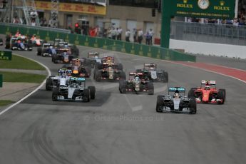 World © Octane Photographic Ltd. Mercedes AMG Petronas F1 W06 Hybrid – Lewis Hamilton leads on the opening lap. Sunday 7th June 2015, F1 Canadian GP Race, Circuit Gilles Villeneuve, Montreal, Canada. Digital Ref: 1299LB1D3599