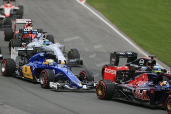 World © Octane Photographic Ltd. Scuderia Toro Rosso STR10 – Carlos Sainz Jnr, McLaren Honda MP4/30 – Fernando Alonso and Sauber F1 Team C34-Ferrari – Marcus Ericsson. Sunday 7th June 2015, F1 Canadian GP Race, Circuit Gilles Villeneuve, Montreal, Canada. Digital Ref: 1299LB1D3620