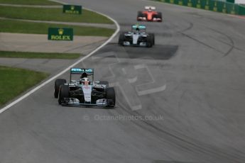 World © Octane Photographic Ltd. Mercedes AMG Petronas F1 W06 Hybrid – Lewis Hamilton, Nico Rosberg and then the Scuderia Ferrari SF15-T of Kimi Raikkonen. Sunday 7th June 2015, F1 Canadian GP Race, Circuit Gilles Villeneuve, Montreal, Canada. Digital Ref: 1299LB1D3648