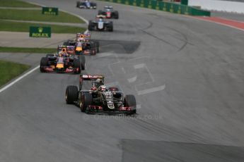 World © Octane Photographic Ltd. Lotus F1 Team E23 Hybrid – Pastor Maldonado then the Infiniti Red Bull Racing RB11s of Daniil Kvyat and Daniel Ricciardo. Sunday 7th June 2015, F1 Canadian GP Race, Circuit Gilles Villeneuve, Montreal, Canada. Digital Ref: 1299LB1D3671