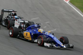 World © Octane Photographic Ltd. Sauber F1 Team C34-Ferrari – Marcus Ericsson and McLaren Honda MP4/30 – Fernando Alonso. Sunday 7th June 2015, F1 Canadian GP Race, Circuit Gilles Villeneuve, Montreal, Canada. Digital Ref: 1299LB1D3781