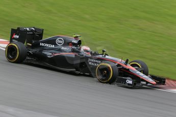 World © Octane Photographic Ltd. McLaren Honda MP4/30 - Jenson Button. Sunday 7th June 2015, F1 Canadian GP Race, Circuit Gilles Villeneuve, Montreal, Canada. Digital Ref: 1299LB1D3932