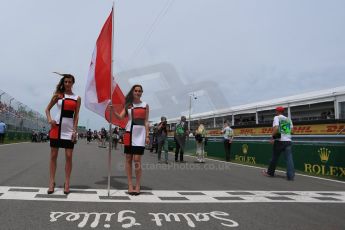 World © Octane Photographic Ltd. Canadian Flag grid girls. Sunday 7th June 2015, F1 Canadian GP Race grid, Circuit Gilles Villeneuve, Montreal, Canada. Digital Ref: 1298LB1D3367