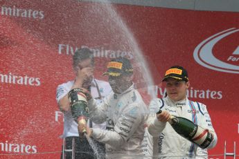 World © Octane Photographic Ltd. Mercedes AMG Petronas Hybrid – Lewis Hamilton (1st) and Williams Martini Racing and Valtteri Bottas (3rd). Sunday 7th June 2015, F1 Canadian GP Podium, Circuit Gilles Villeneuve, Montreal, Canada. Digital Ref: 1300LB1D4275
