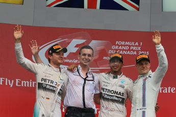 World © Octane Photographic Ltd. Mercedes AMG Petronas Hybrid – Lewis Hamilton (1st), Nico Rosberg (2nd) and Williams Martini Racing – Valtteri Bottas (3rd) – For Mercedes - Riccardo Musconi, Race Engineer. Sunday 7th June 2015, F1 Canadian GP Podium, Circuit Gilles Villeneuve, Montreal, Canada. Digital Ref: 1300LB1D4340