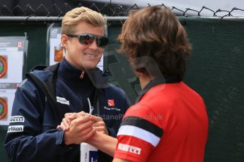 World © Octane Photographic Ltd. Sauber F1 Team C34-Ferrari – Marcus Ericsson and Manor Marussia F1 Team MR03B – Roberto Merhi. Sunday 7th June 2015, F1 Canadian GP Paddock, Circuit Gilles Villeneuve, Montreal, Canada. Digital Ref: 1297LB1D2955