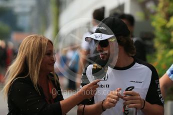 World © Octane Photographic Ltd. McLaren Honda MP4/30 – Fernando Alonso. Sunday 20th September 2015, F1 Singapore Grand Prix Drivers Parade, Marina Bay. Digital Ref: 1435LB1D8465