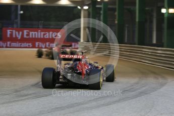 World © Octane Photographic Ltd. Scuderia Toro Rosso STR10 – Carlos Sainz Jnr and Max Verstappen. Friday 18th September 2015, F1 Singapore Grand Prix Practice 1, Marina Bay. Digital Ref: