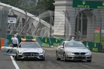 World © Octane Photographic Ltd. Charlie Whiting and Herbie Blash examining the new 12 after the new Anderson bridge layout change. Friday 18th September 2015, F1 Singapore Grand Prix Practice 1, Marina Bay. Digital Ref: 1428LB1L9621